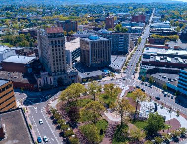 Aerial view of urban park and buildings.